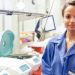 A girl standing in the laboratory as a technician